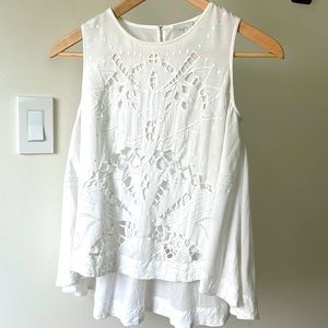 Beautiful blouse from Anthropologie with laser cut detail XXS